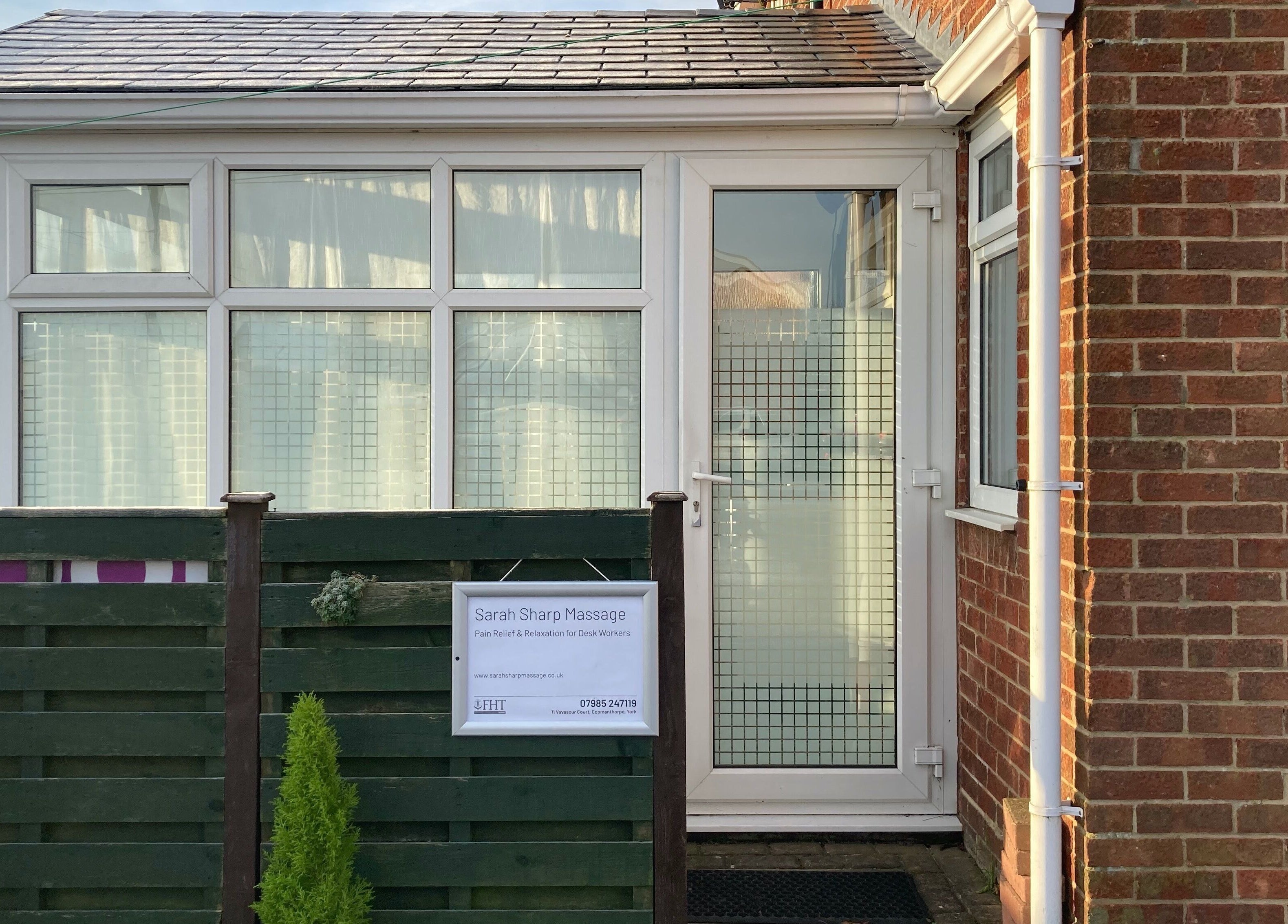 Entrance of Sarah Sharp Massage in Copmanthorpe, England, showcasing a serene exterior for relaxation.