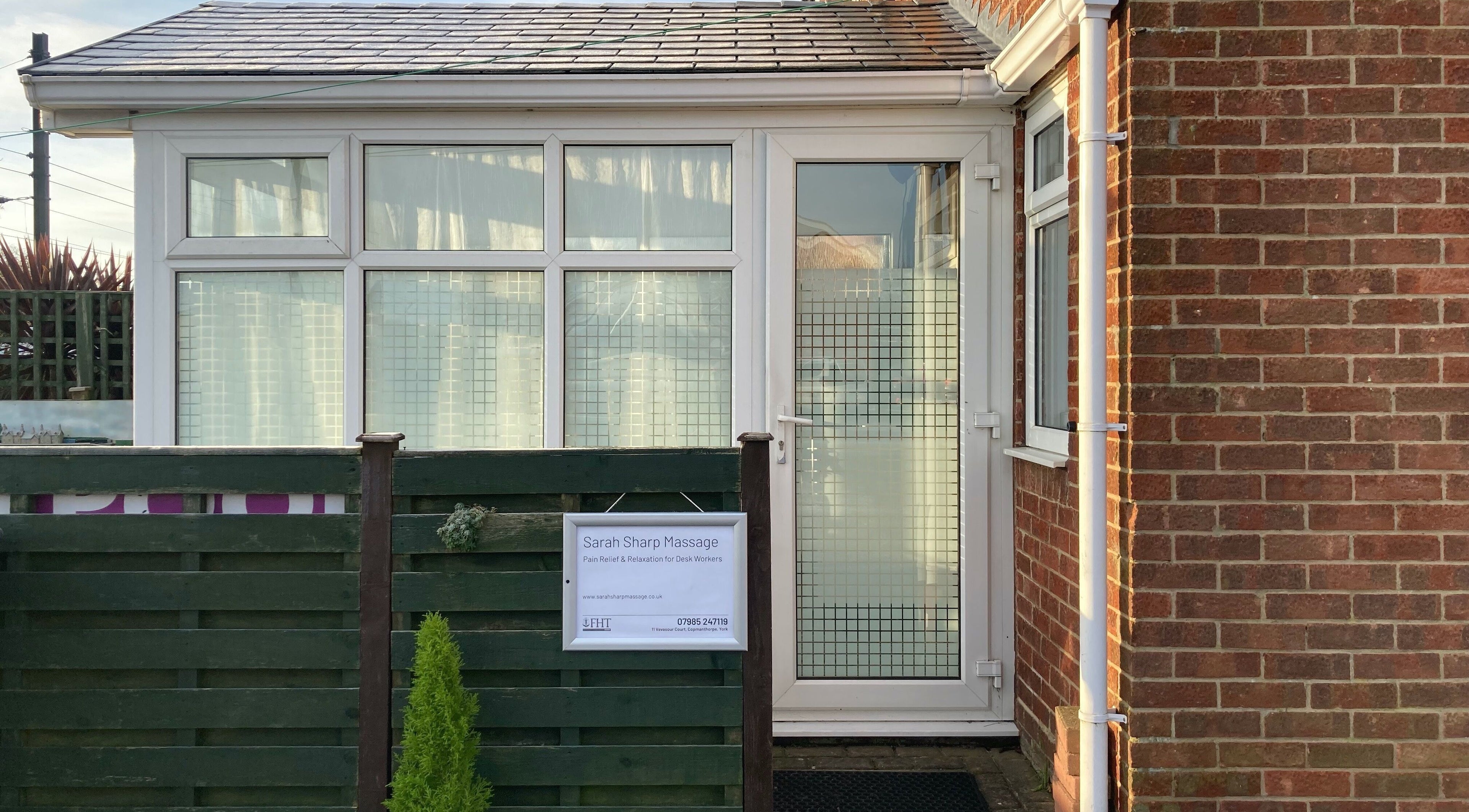 Entrance of Sarah Sharp Massage in Copmanthorpe, England, showcasing a serene exterior for relaxation.