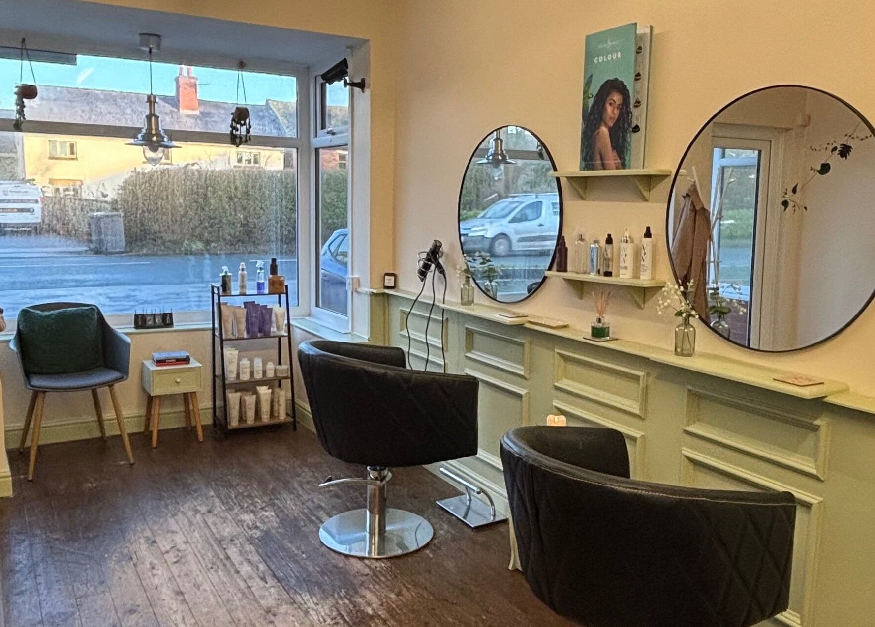 Niamh Elizabeth Hairdressing salon interior in Preston, England, GB, showcasing modern seating and stylish decor.