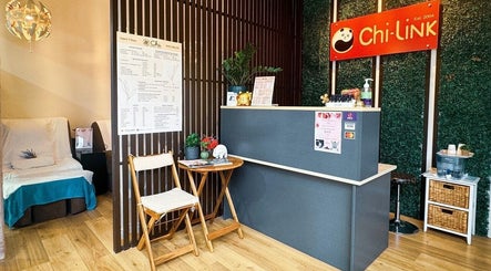 Reception area of Chi Link Massage and Wellness, Acacia Ridge, Queensland, AU, featuring serene decor and seating.