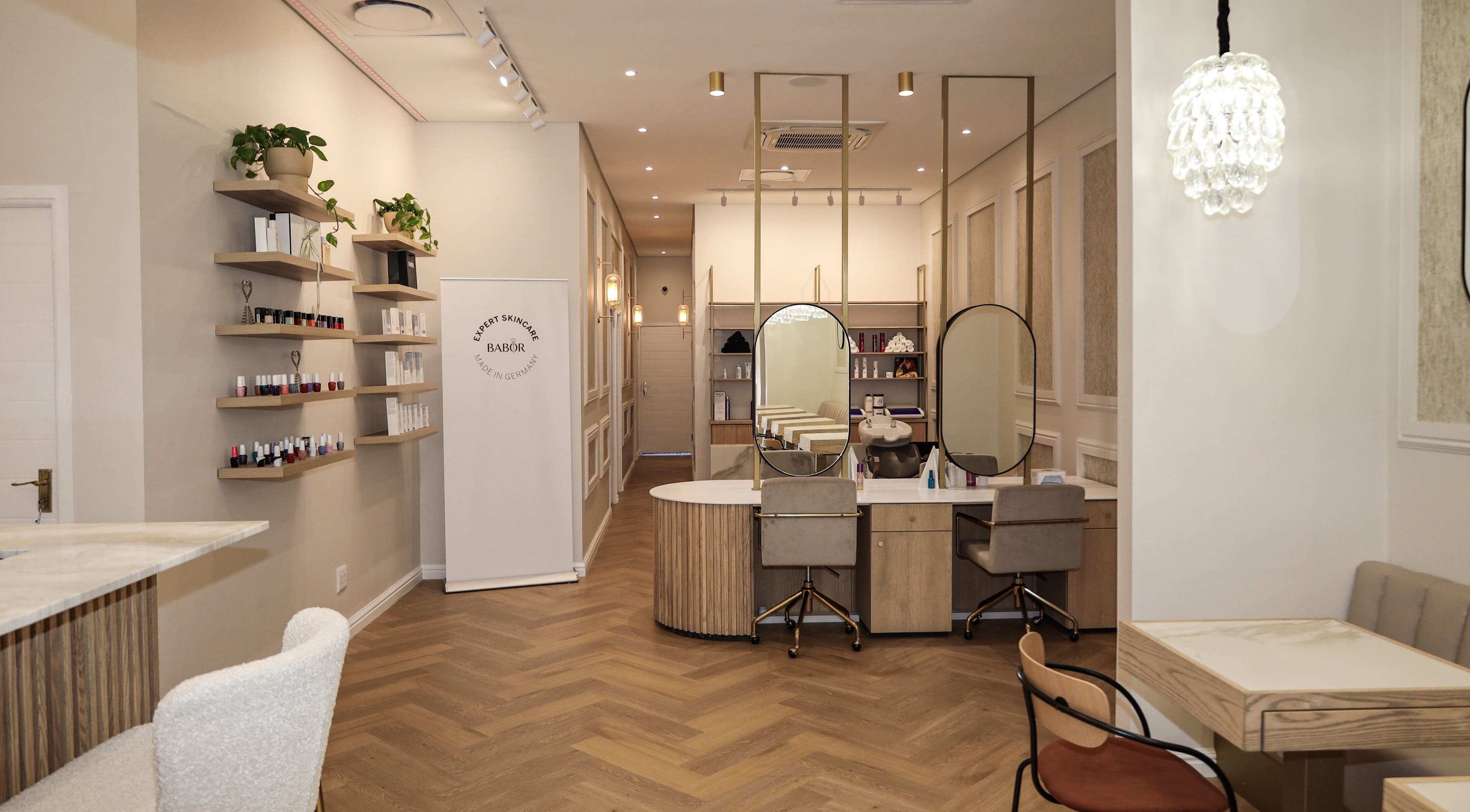 Elegant interior of Babygirl24/7 salon in Cape Town, Western Cape, ZA with modern decor and beauty stations.