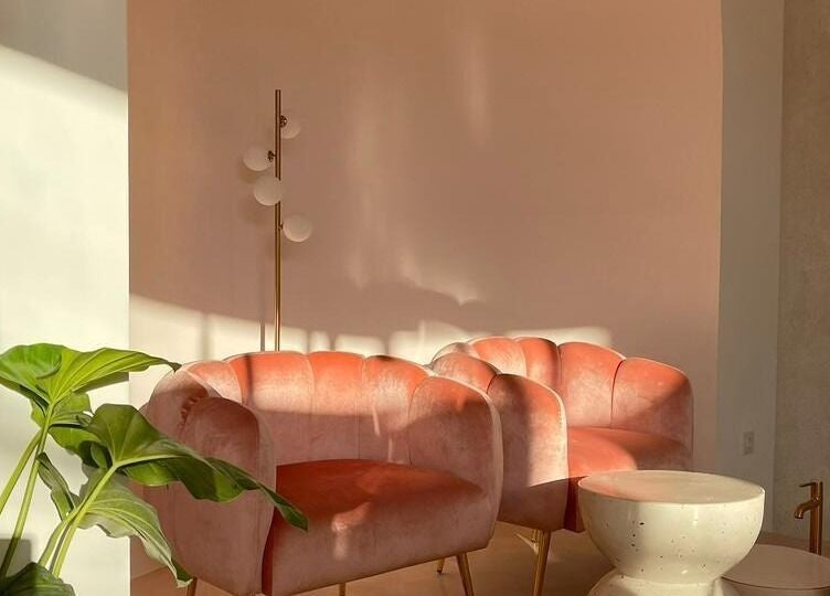 Elegant seating area at Moiselle Bali in Bali, Bali, ID, with peach chairs and soft lighting.