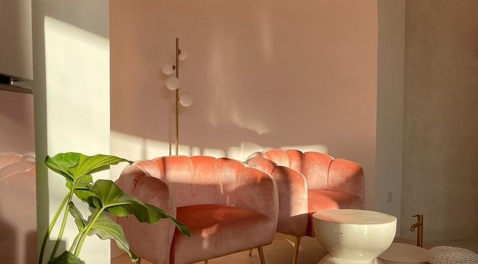 Elegant seating area at Moiselle Bali in Bali, Bali, ID, with peach chairs and soft lighting.