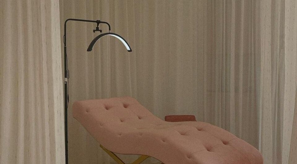 Serene treatment room at Moiselle Bali featuring a plush pink bed, located in Bali, Bali, ID.