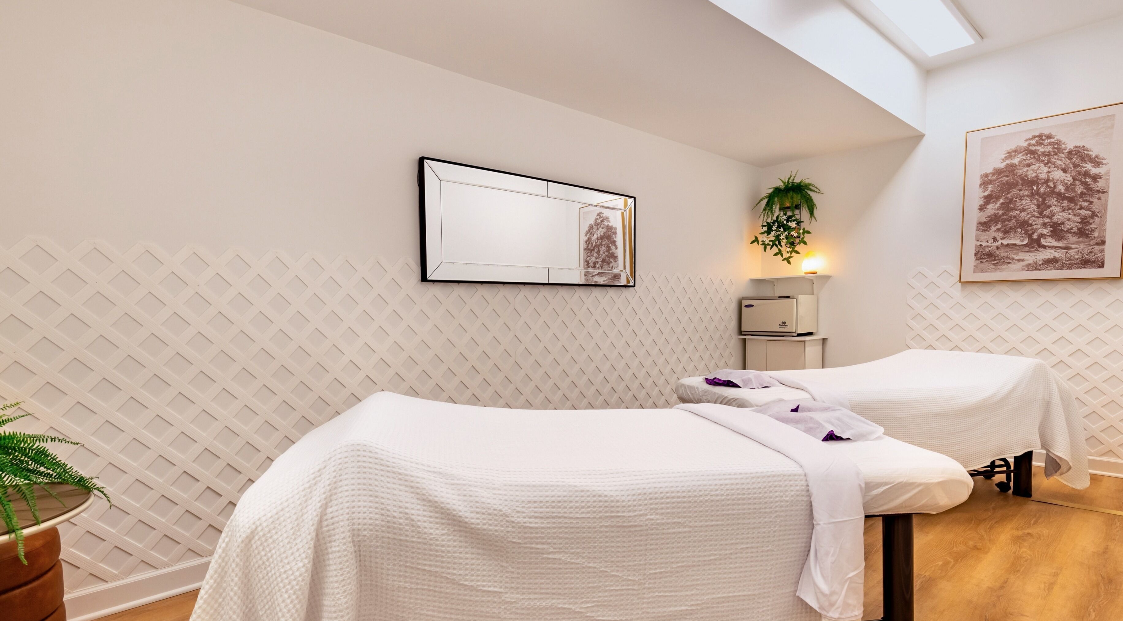 Tranquil massage room at Mongolian MassageLAB Chicago, featuring two beds, located in Chicago, Illinois, US.