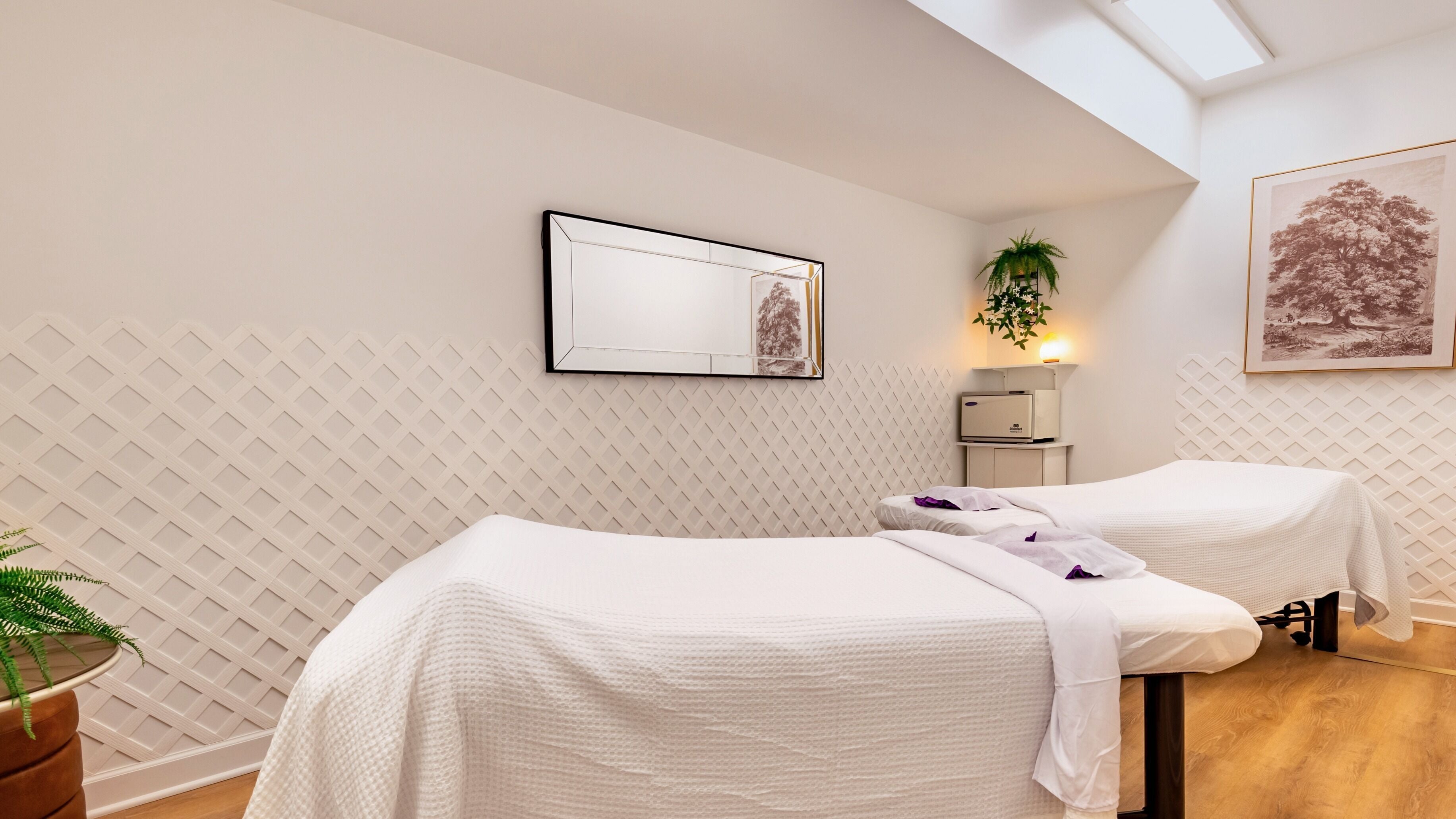 Tranquil massage room at Mongolian MassageLAB Chicago, featuring two beds, located in Chicago, Illinois, US.