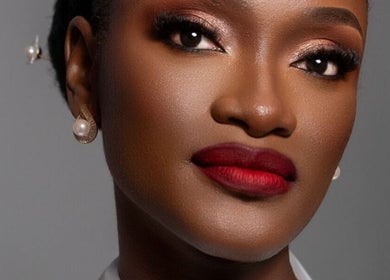 Flawless makeup at Leessential Beauty Makeup Studio, Vreed En Hoop, GY showcasing striking red lipstick.