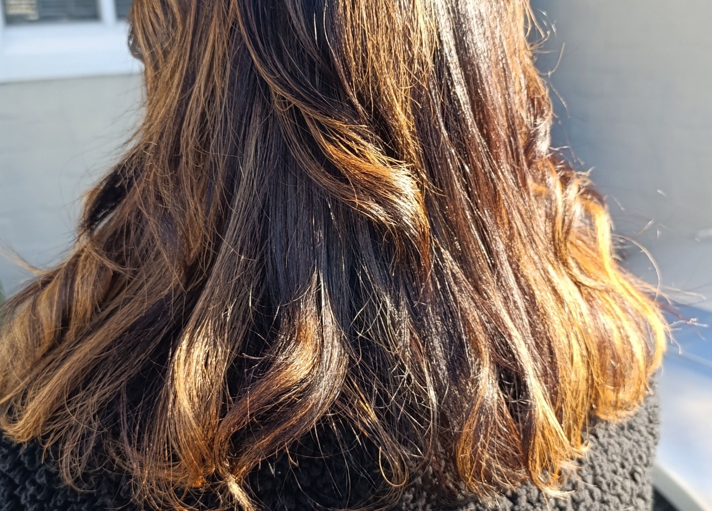 Sunlit brown hair styled beautifully at Divas Only Mobile Salon, Cape Town, Western Cape, ZA.