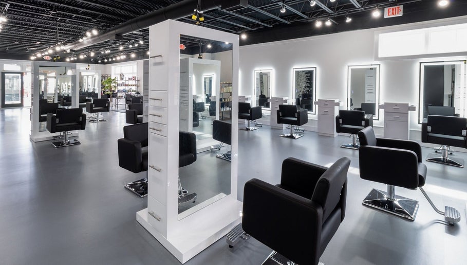 Sleek salon interior of Studio LaSalle in DENTON, United States, US, featuring modern styling stations.