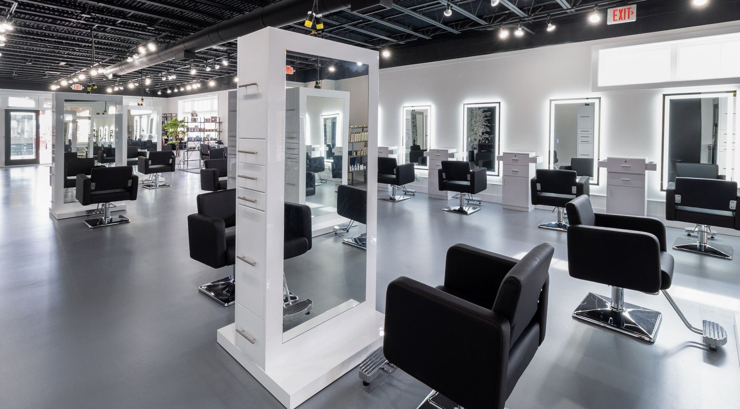 Sleek salon interior of Studio LaSalle in DENTON, United States, US, featuring modern styling stations.