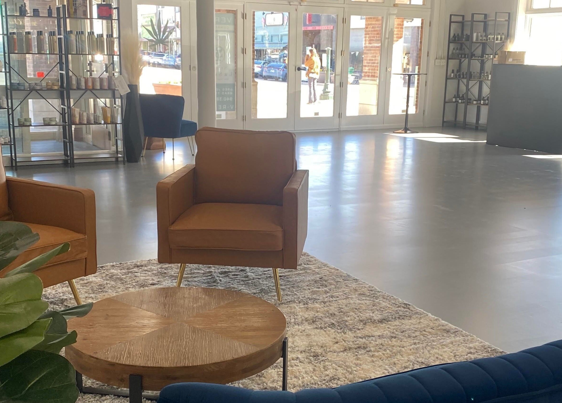 Elegant seating area in Studio LaSalle, DENTON, United States. Modern decor with cozy chairs and natural light.