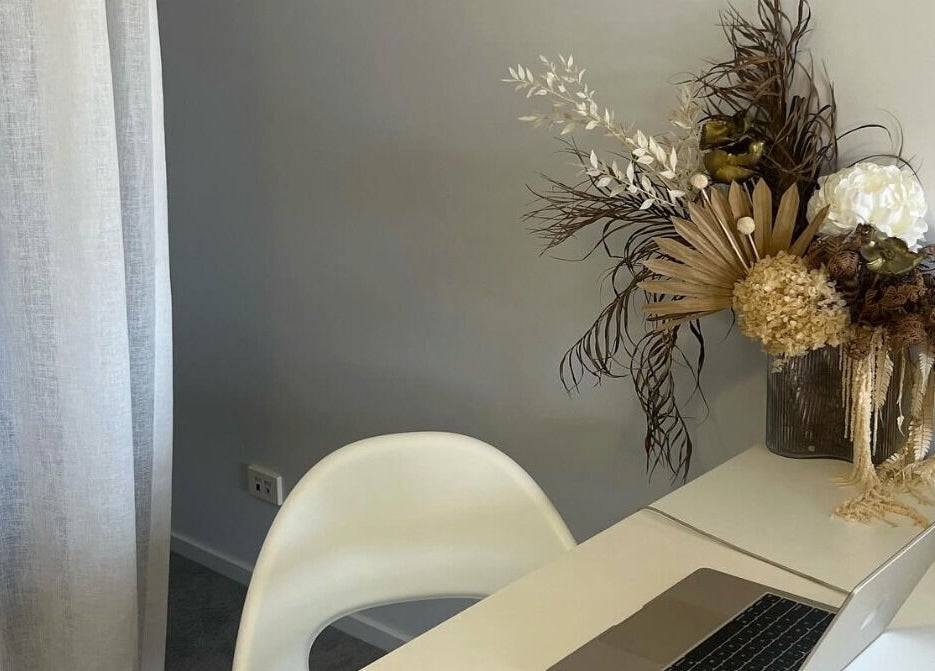 Elegant workspace at Glam R Us Face and Body in Terrigal, New South Wales, AU with modern decor and laptop.