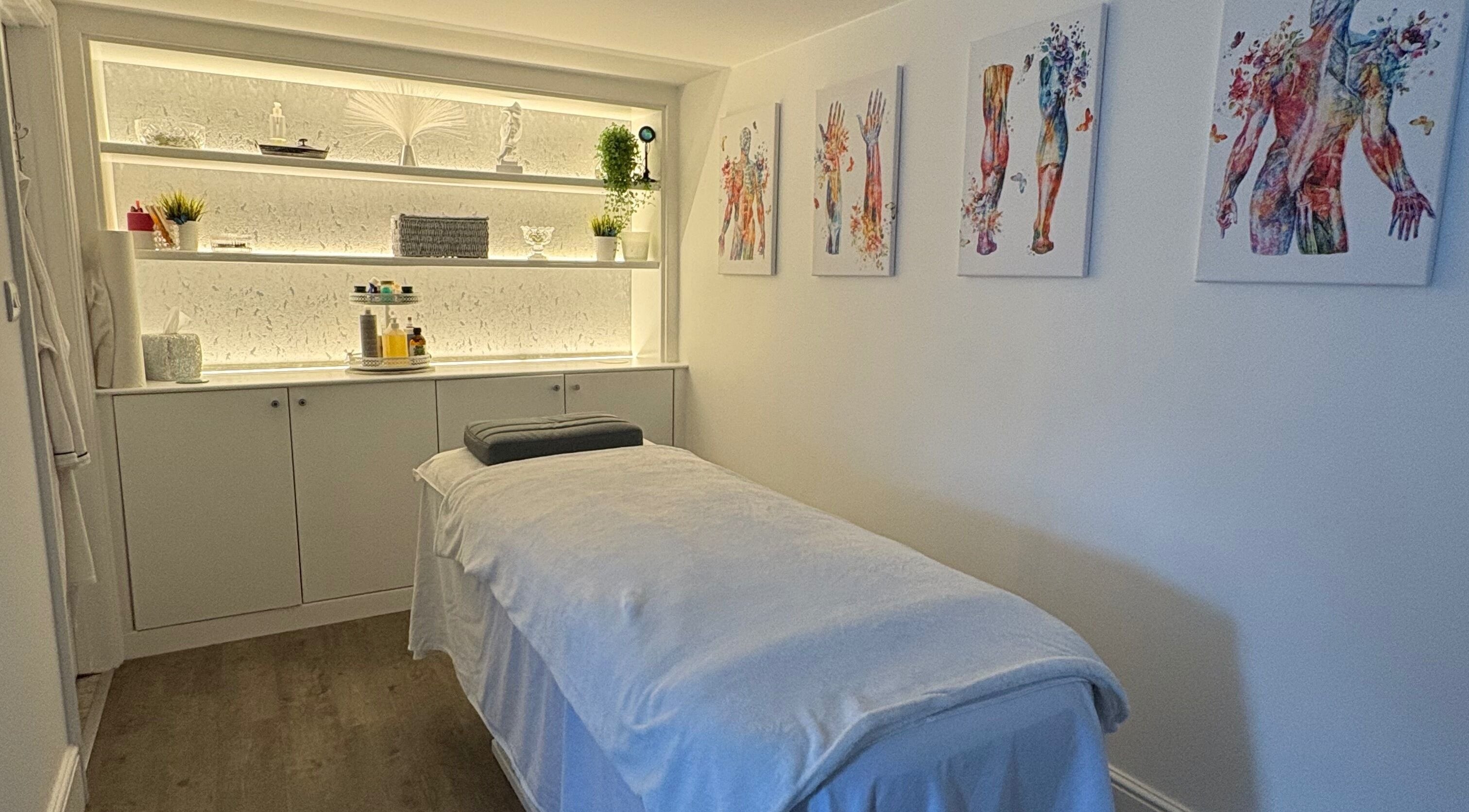 Relaxing massage room at BodyLogic, Higham Ferrers, GB with elegant decor and soothing ambiance.