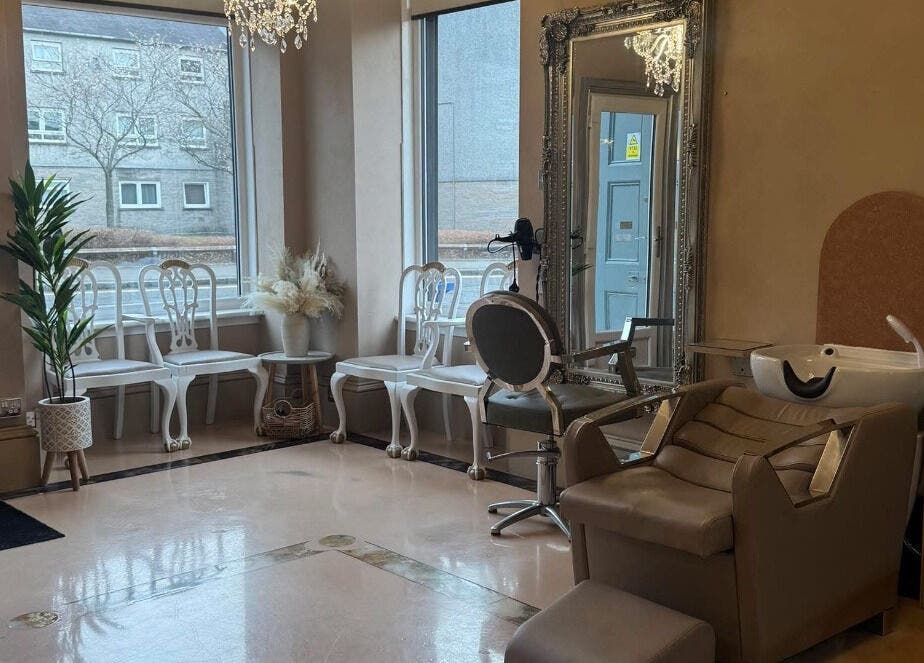 Chic interior of The salon Tillicoultry, Tillicoultry, Scotland, GB showcasing mirrors and seating.