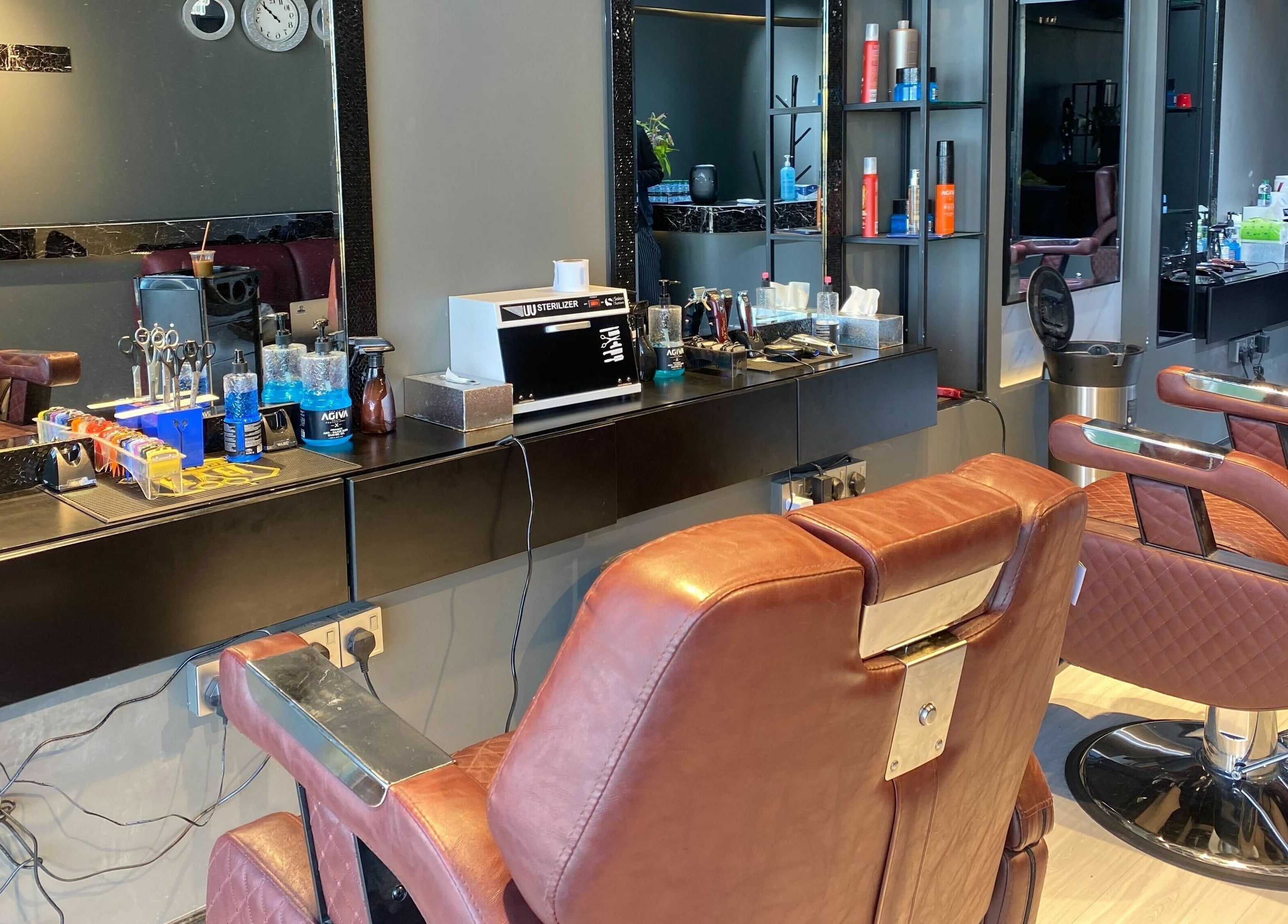 Modern barber chairs and styling products at NjM Barbershop -النجم الخفي للحلاقة, Riyadh, Riyadh Province, SA.