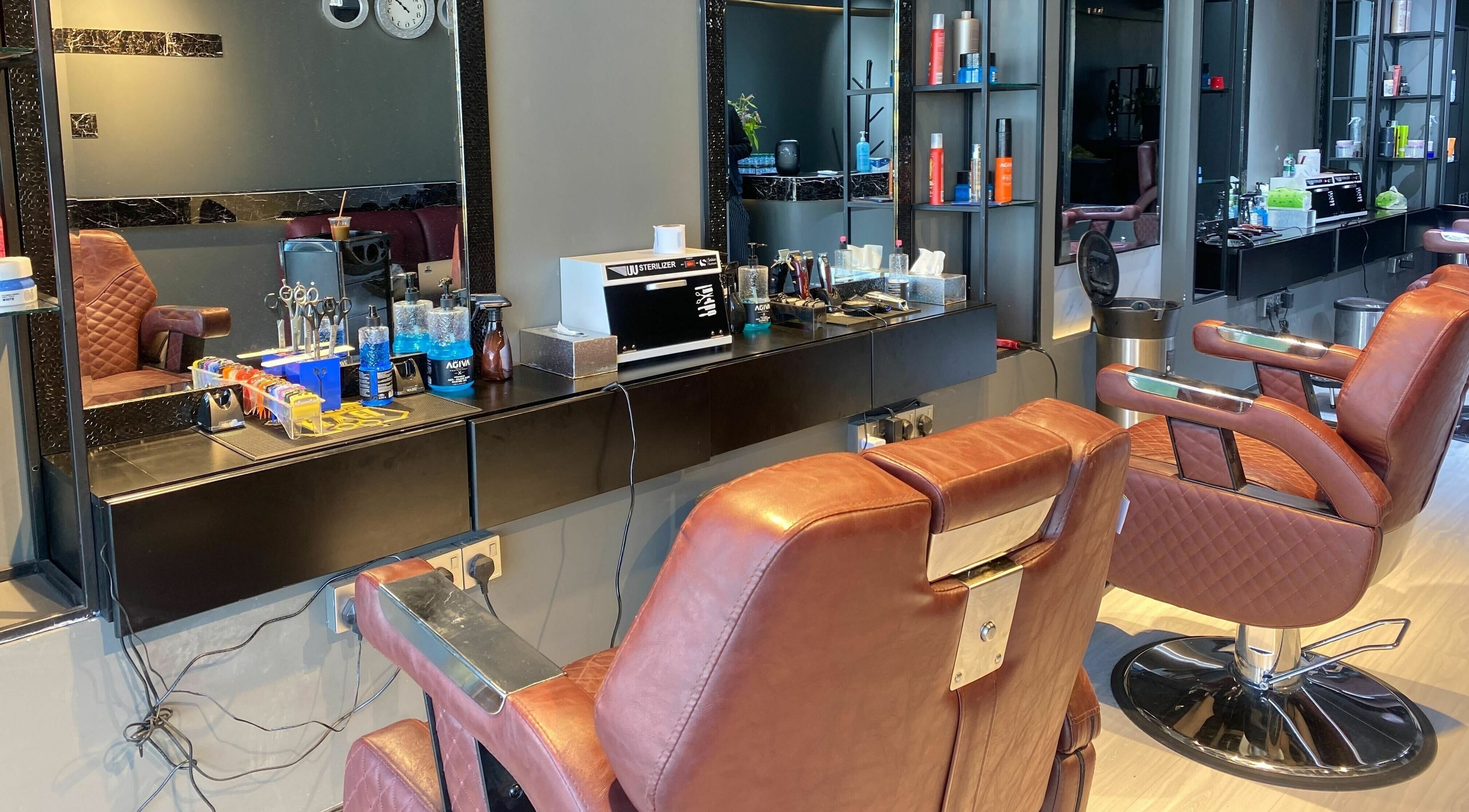 Modern barber chairs and styling products at NjM Barbershop -النجم الخفي للحلاقة, Riyadh, Riyadh Province, SA.