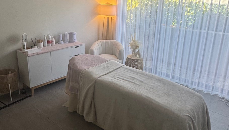 Relaxing treatment room at Sharn's Beauty Room, Bennett Springs, Western Australia, AU with spa bed and soothing decor.