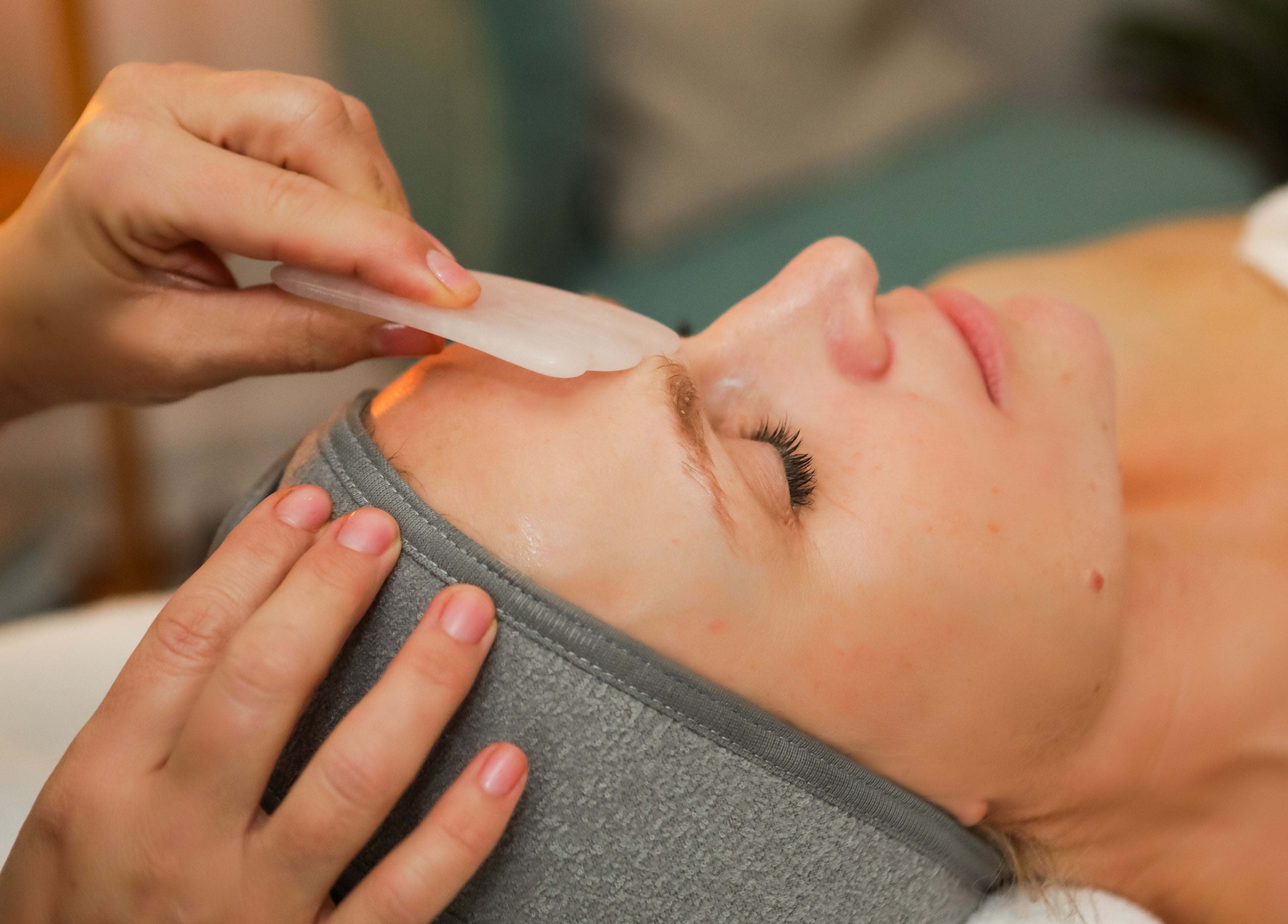 A rejuvenating Gua Sha facial at Jill at No.3 in Hale Barns, England, GB, promoting wellness and relaxation.