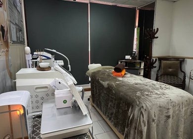 Relaxing treatment room at Mio Spa Studio, Caracas, Miranda, VE, featuring a plush massage table.