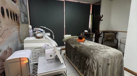 Relaxing treatment room at Mio Spa Studio, Caracas, Miranda, VE, featuring a plush massage table.