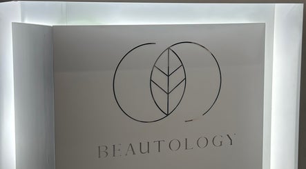 Illuminated Beautology Clinic logo at Tyre, South Governorate, LB, symbolizing elegance and wellness.