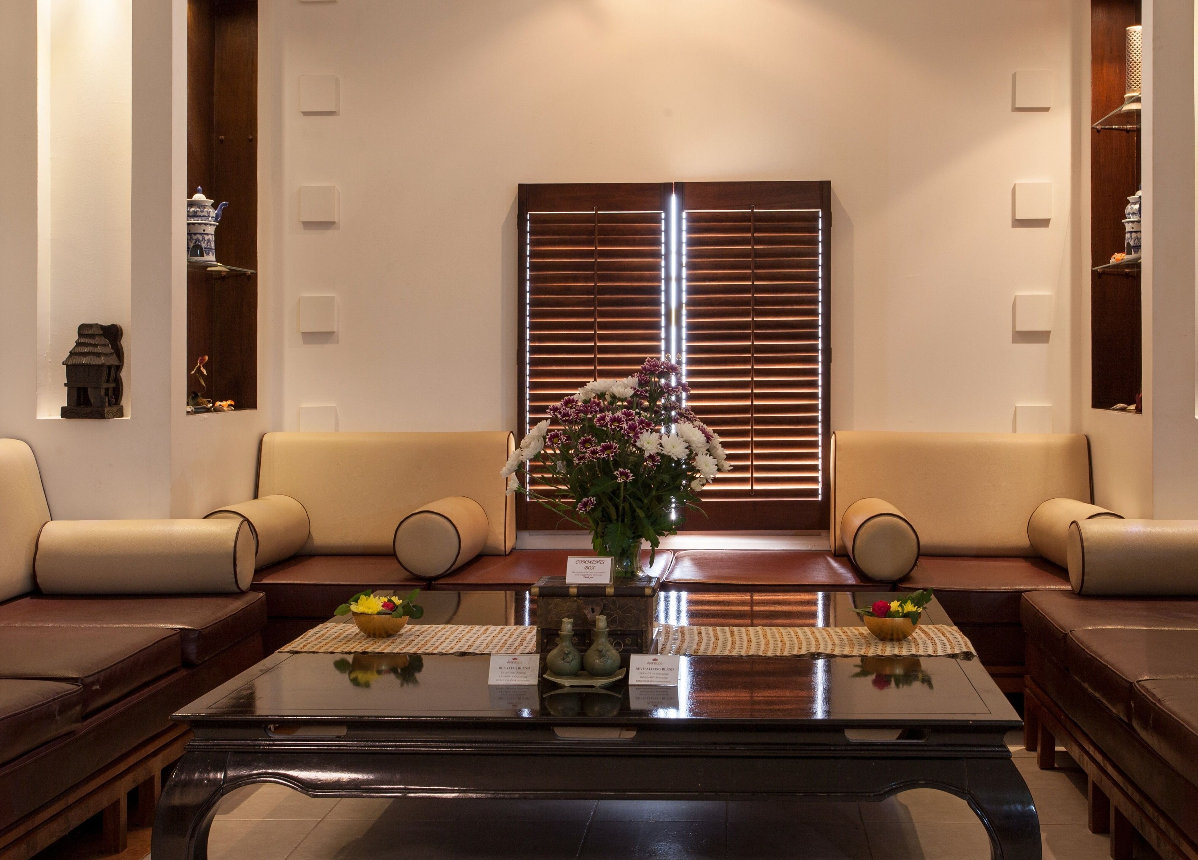 Elegant lounge with plush seating and flowers at Ayana Spa Muscat, Muscat, Muscat Governorate, OM.