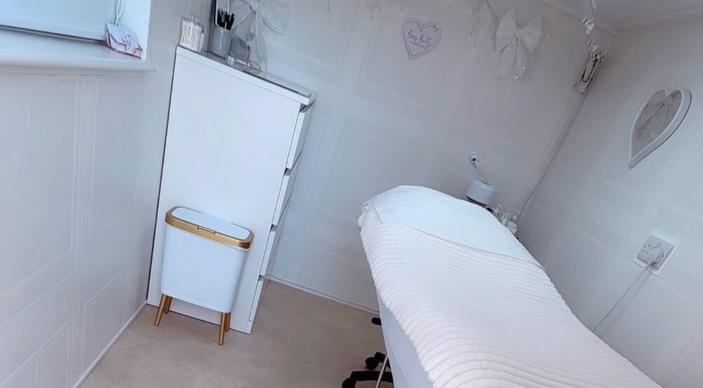 Cozy treatment room at Bows Beauty & Aesthetics, Bognor Regis, England, GB with a comfortable bed.