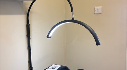 Modern lamp over beauty treatment area at Beauty by loz, Exeter, England, GB.
