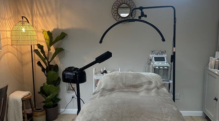 Cozy skincare treatment room at Ameliore Skincare, Northwich, England, GB with modern equipment and calming decor.