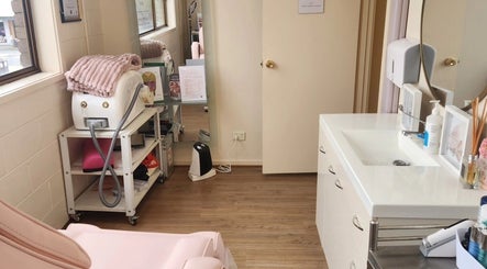Cozy treatment room at Maddi's Cosmetic Clinique, Melbourne, Victoria, AU, with modern amenities.
