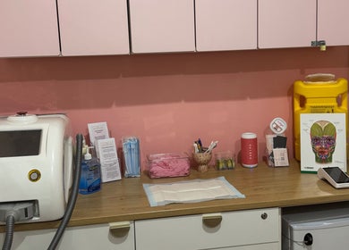 Treatment room equipment at Maddi's Cosmetic Clinique, Melbourne, Victoria, AU with a welcoming pink tone.