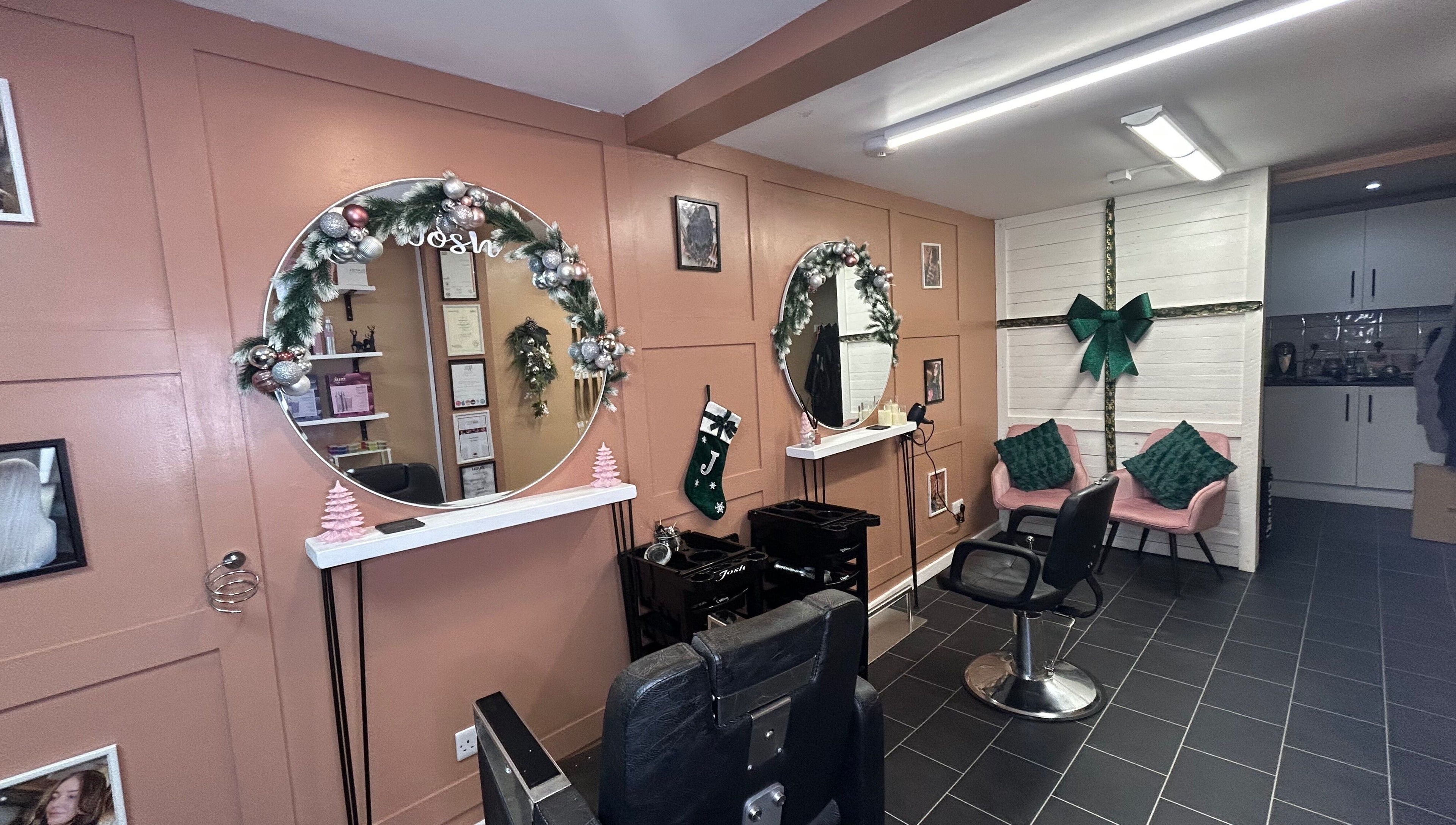 Stylish salon decor with mirrors at Josh’s Hair Hideaway, Leicester, England, GB.