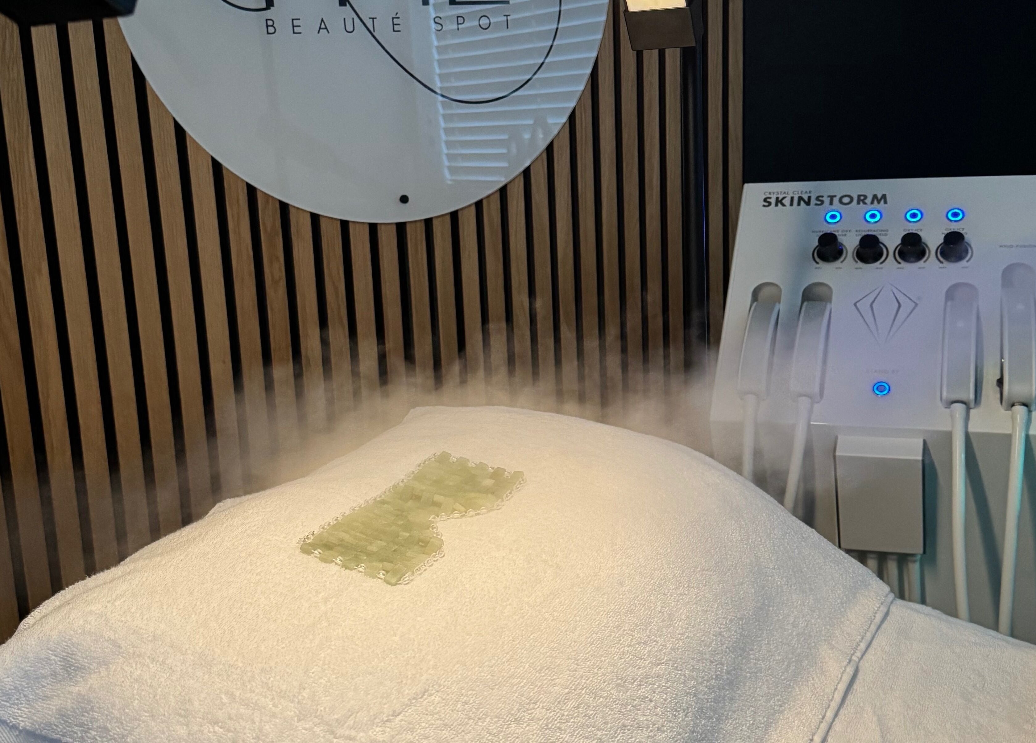 The Beauté Spot's mist therapy room in Ampthill, England, GB with a jade mask and Skinstorm device.