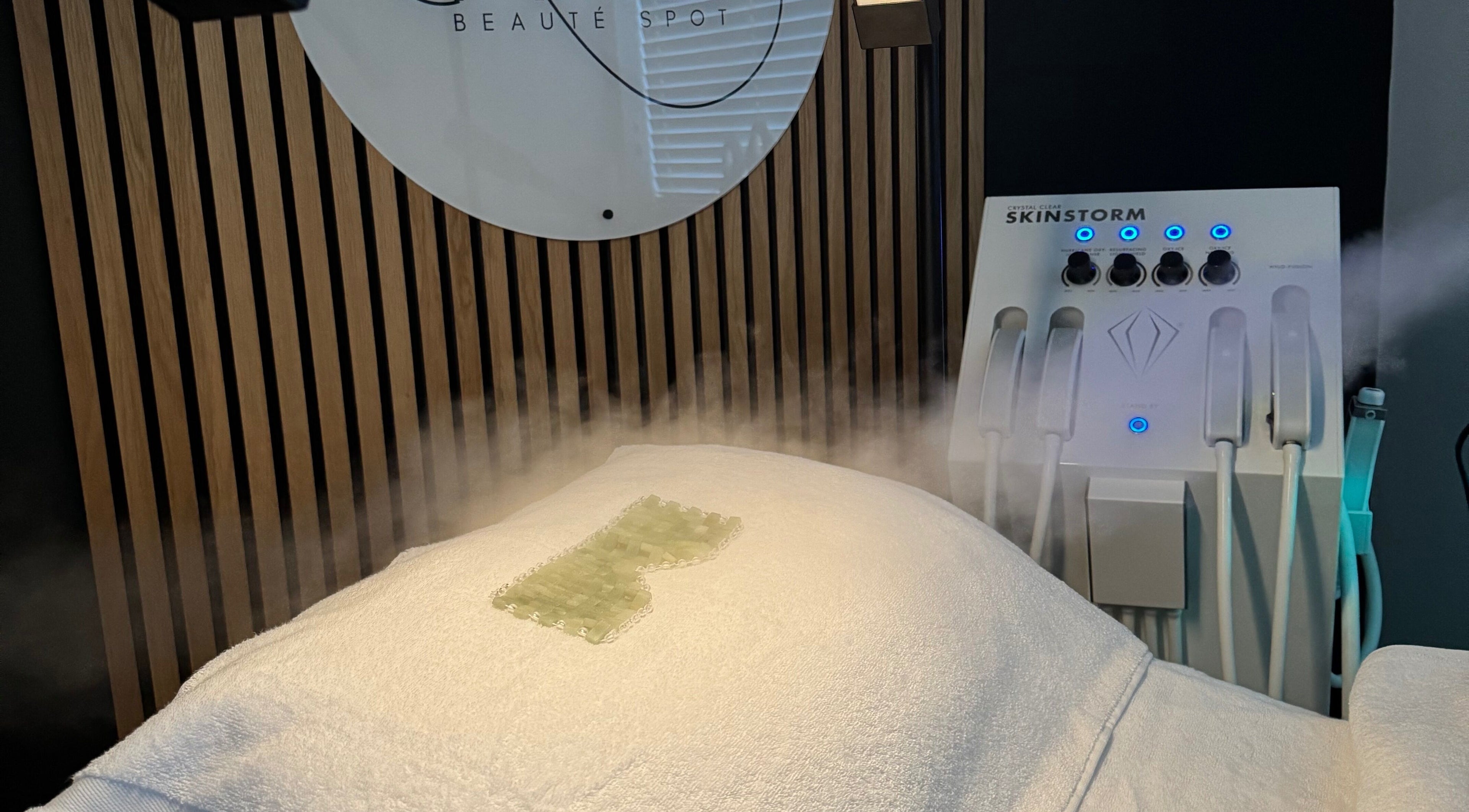 The Beauté Spot's mist therapy room in Ampthill, England, GB with a jade mask and Skinstorm device.
