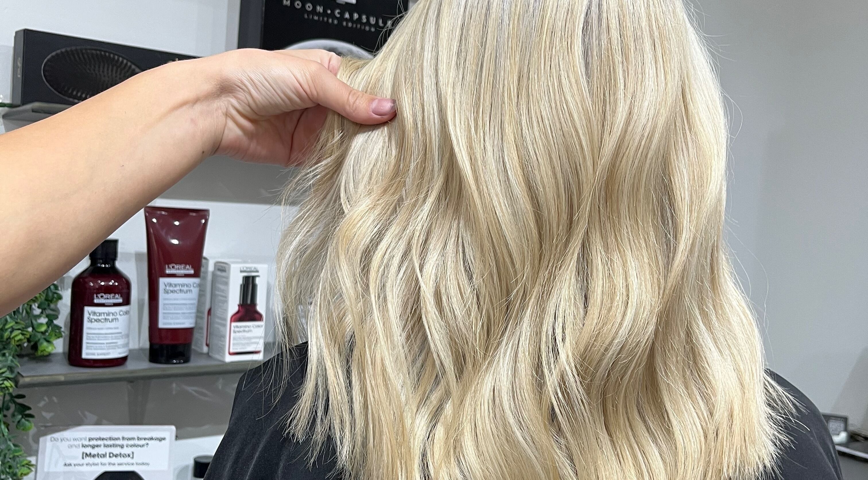 Blonde wavy hair treatment at Eclipse Hair Salon, Houghton Regis, England, GB.