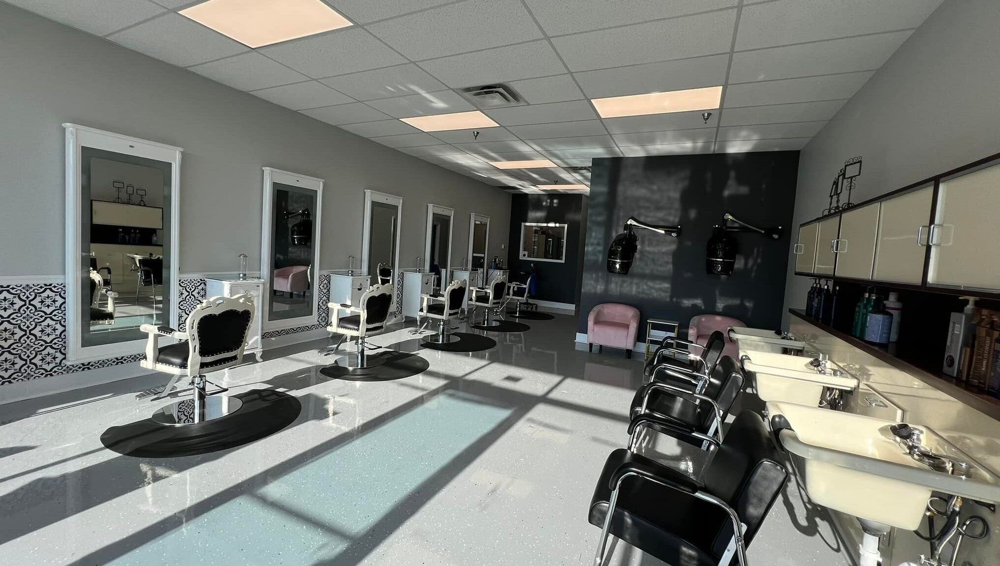 Elegant interior of The A Salon and Spa in Lyman, South Carolina, US with classic styling chairs and mirrors.
