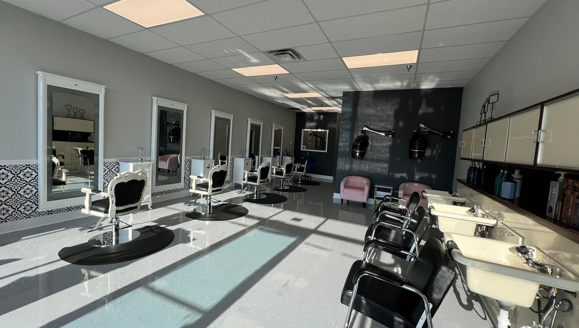 Elegant interior of The A Salon and Spa in Lyman, South Carolina, US with classic styling chairs and mirrors.