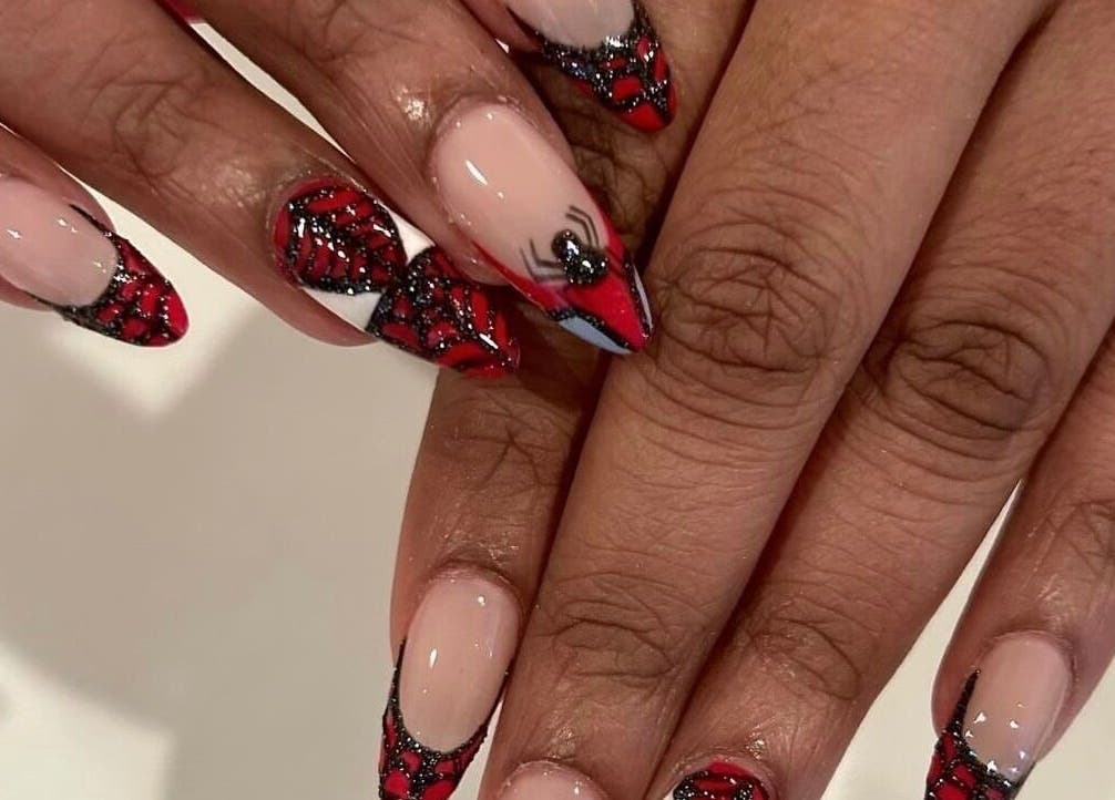 Spider-Man inspired nail design at Nails By Hineni, Brambleton, Virginia, US.