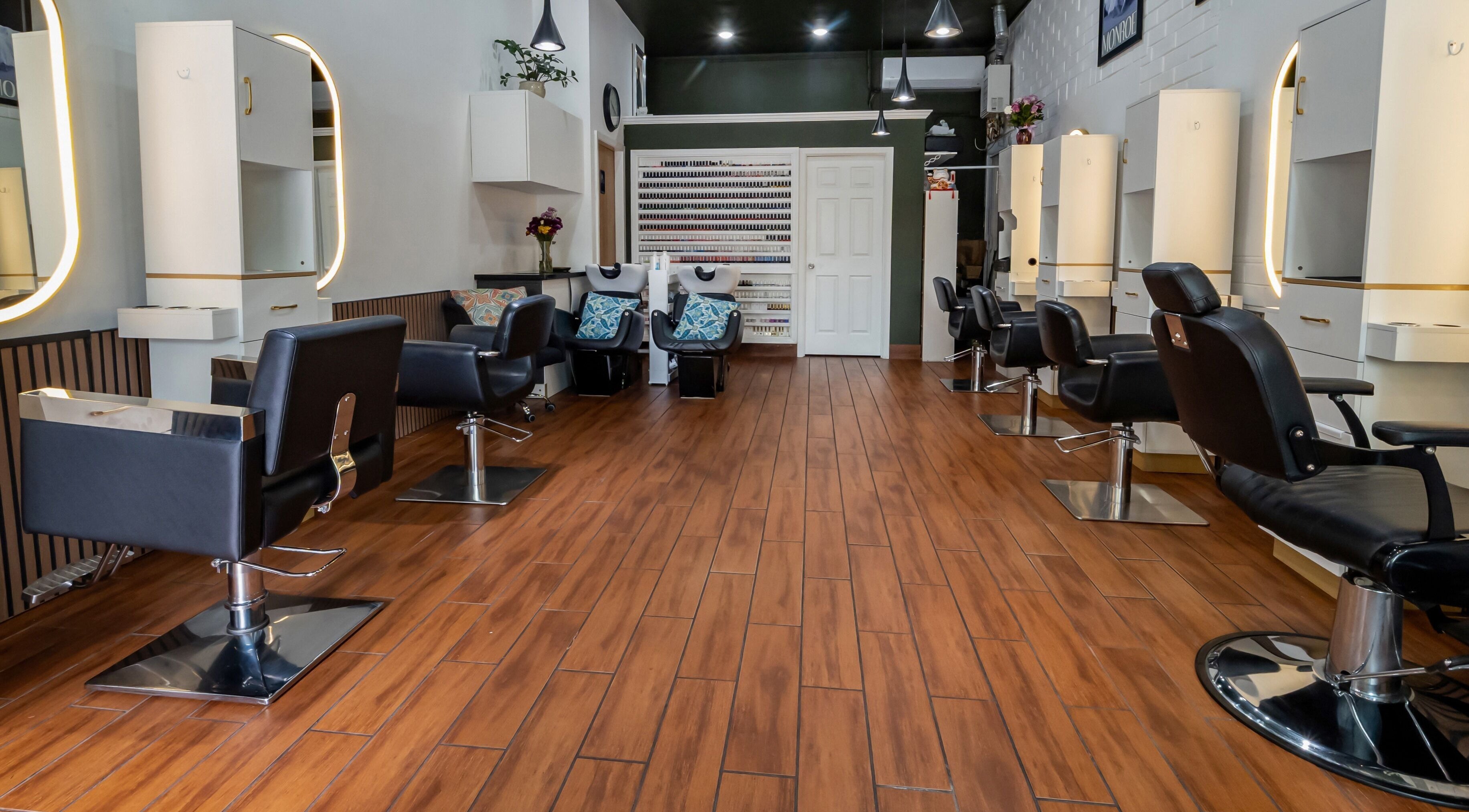 Modern interior of Bella Beauty Salon in Palo Alto, California, US with sleek chairs and stylish decor.