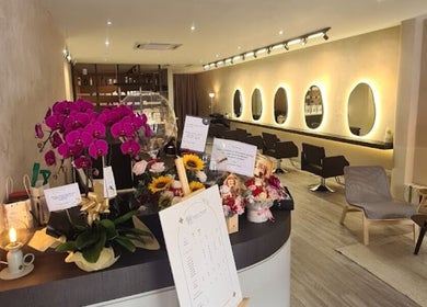 Adam’s Parlour interior with vibrant flowers and stylish chairs in Kuala Lumpur, Wilayah Persekutuan Kuala Lumpur, MY.