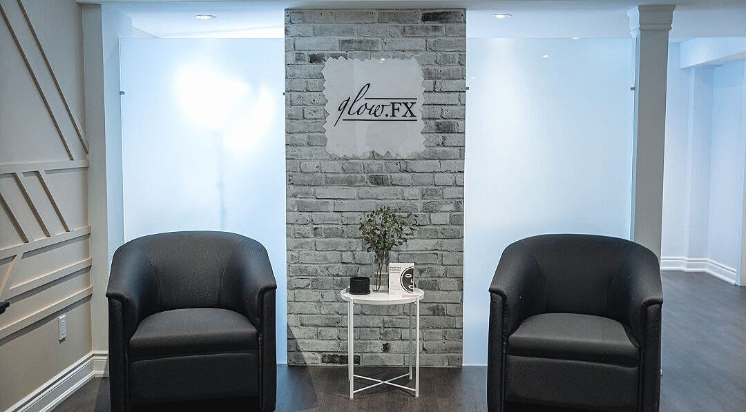 Inviting lounge area at Glow FX, Barrie, Ontario, CA, featuring elegant seating and modern decor.