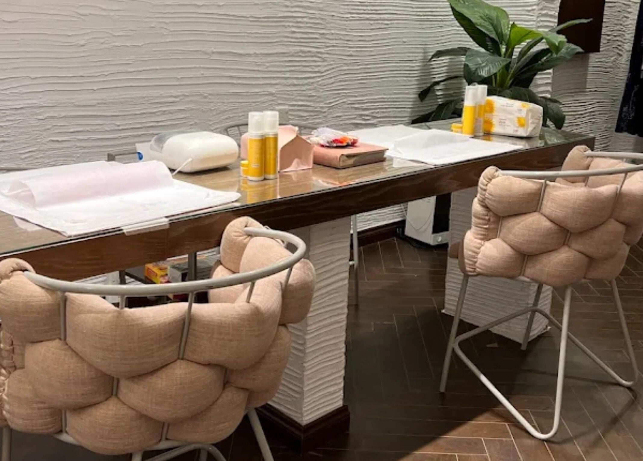 Modern nail station at Claws Nail Bar - Jeddah, featuring chic seating in Jeddah, Makkah Province, SA.