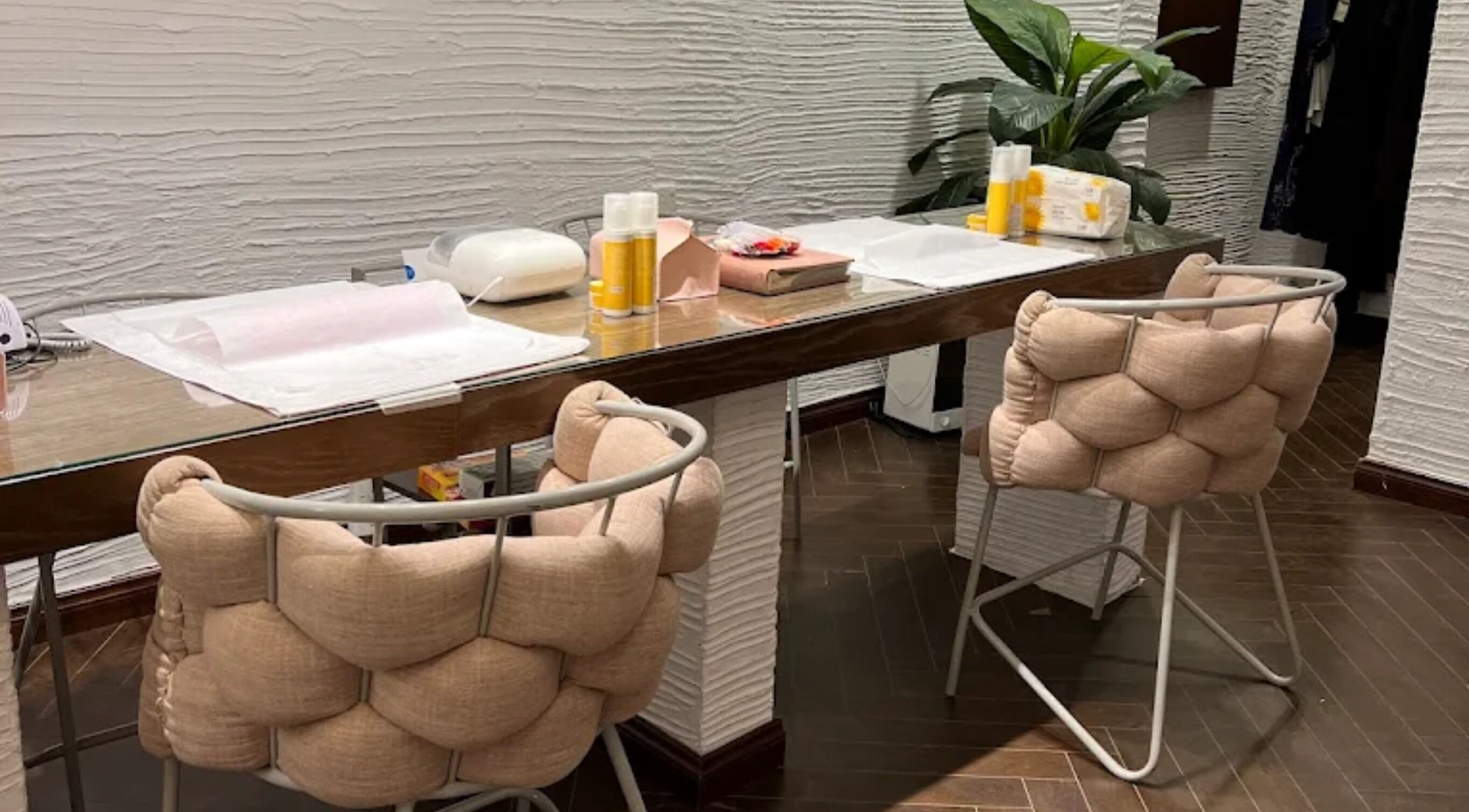 Modern nail station at Claws Nail Bar - Jeddah, featuring chic seating in Jeddah, Makkah Province, SA.