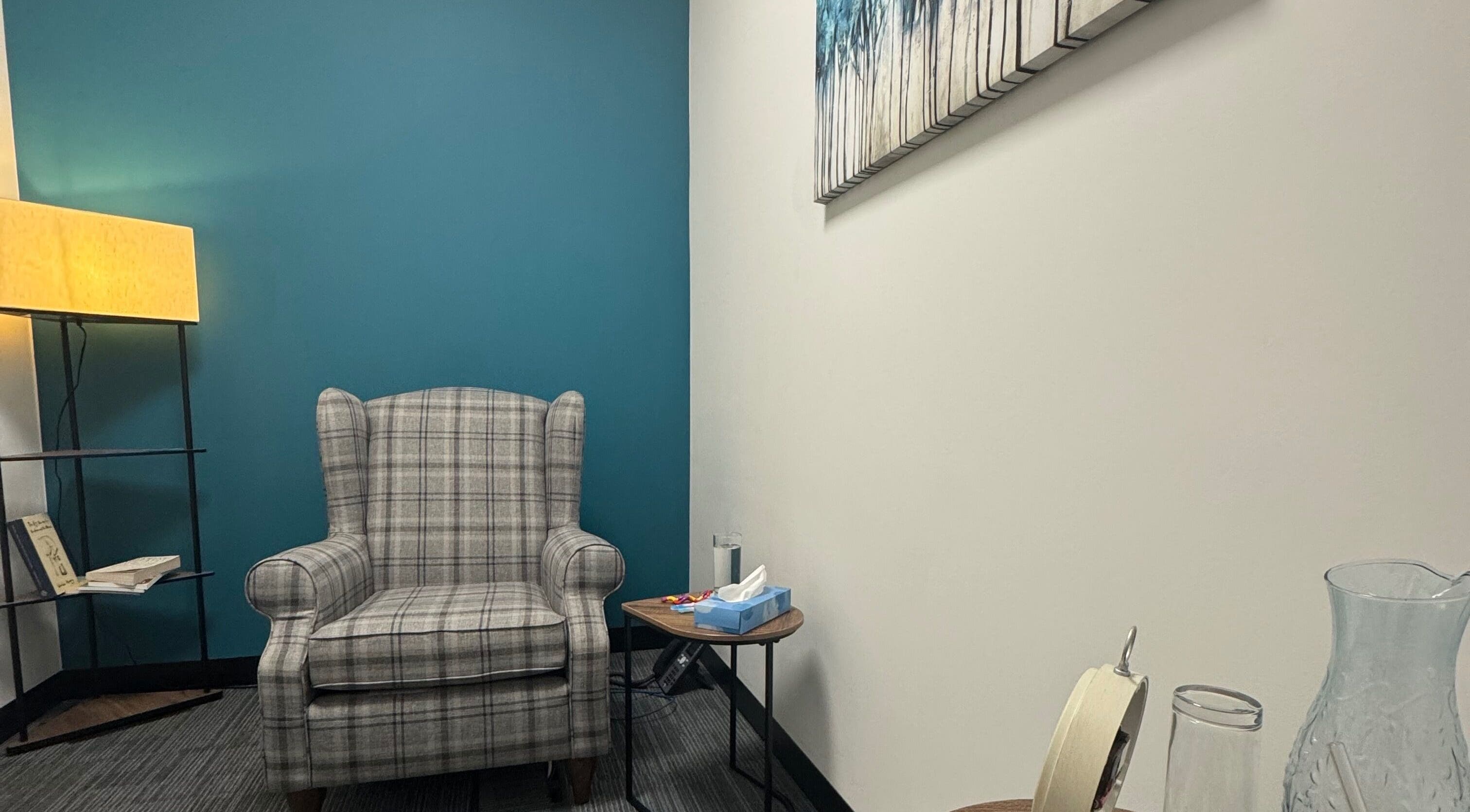 Cozy counselling room at Emily Nicholls Counselling, Stoke-on-Trent, England, GB. Features a comfy armchair.