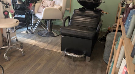 Stylish salon chairs and wash basin at Awesome Hair Is, Eagleby, Queensland, AU.
