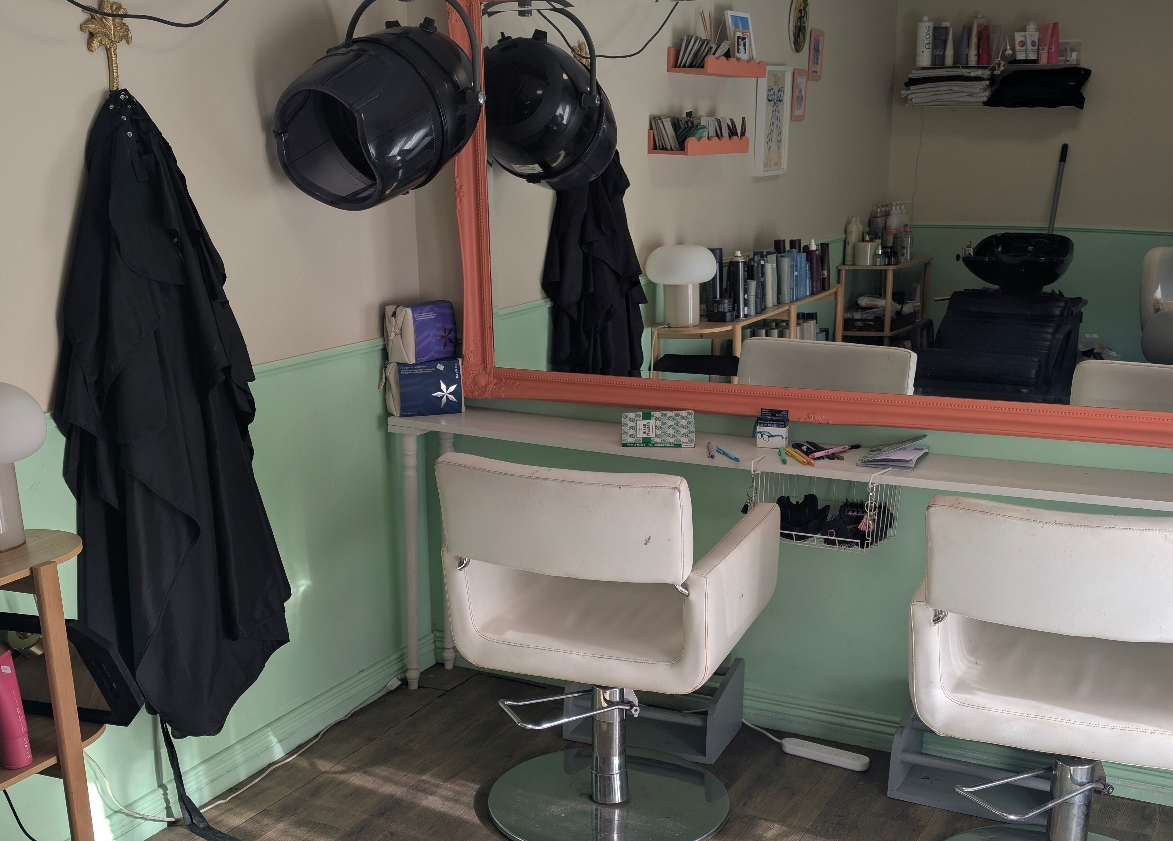 Sleek styling station at Awesome Hair Is in Eagleby, Queensland, AU with modern decor and hair care products.