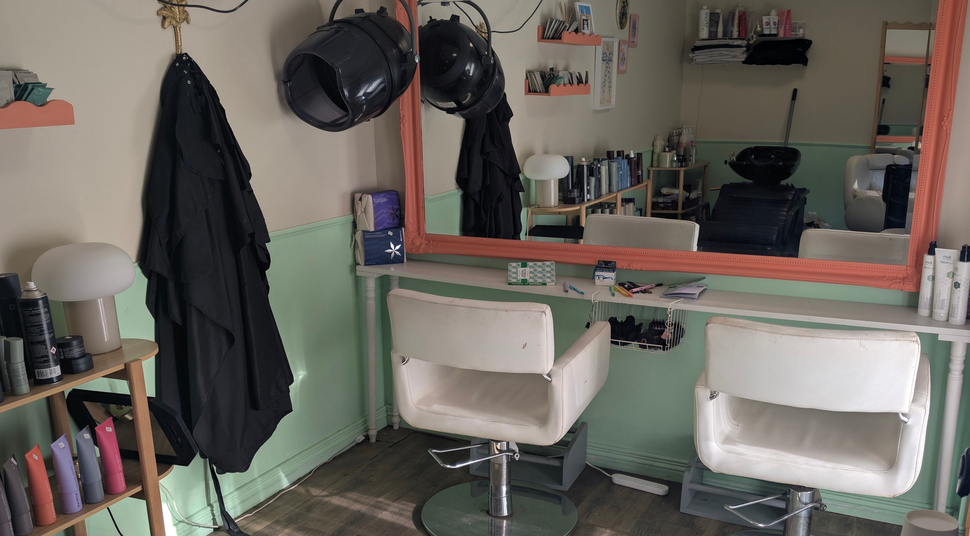 Sleek styling station at Awesome Hair Is in Eagleby, Queensland, AU with modern decor and hair care products.