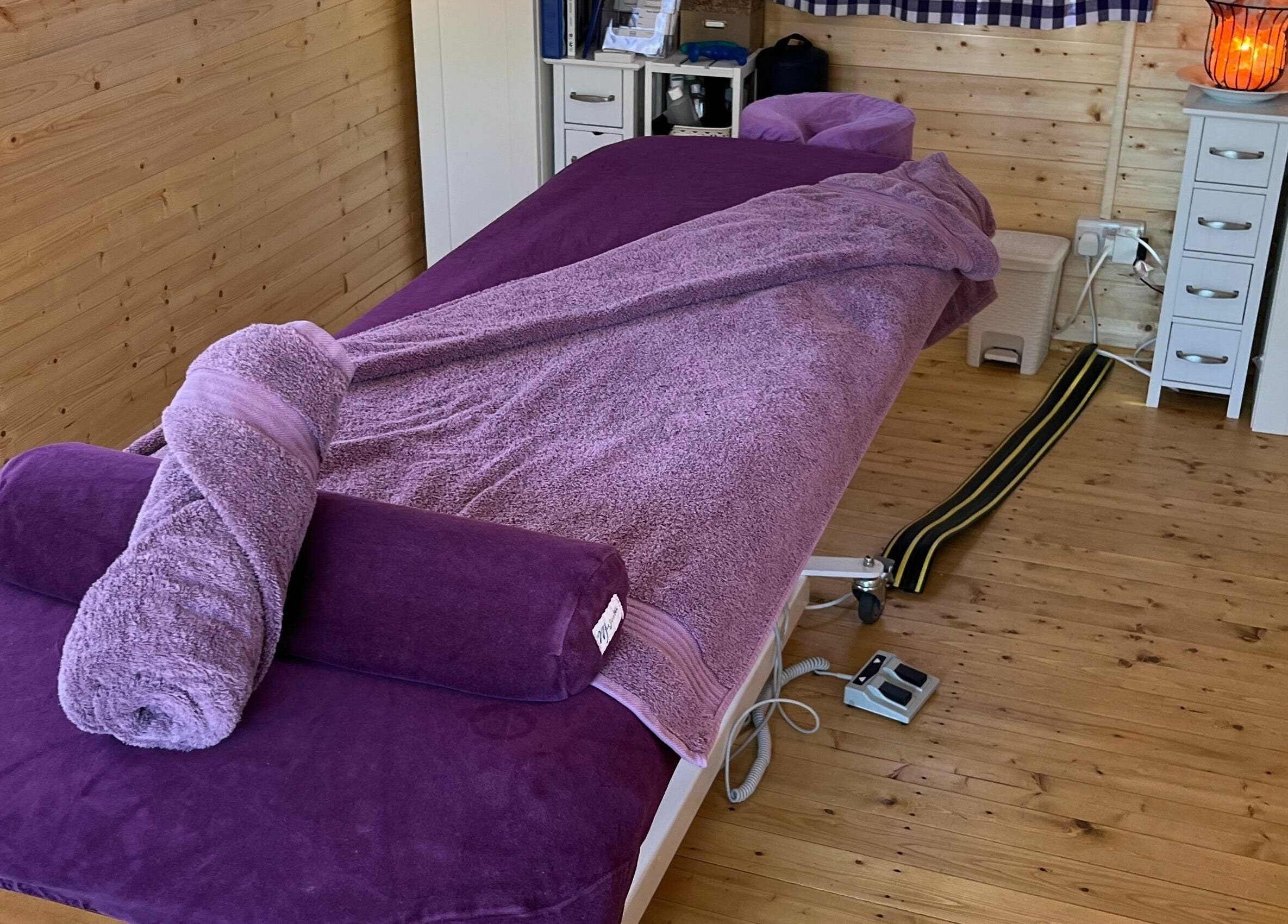 Cozy massage room at Emma Cliffe - Holistic and Oncology Massage Therapist, Mulbarton, England, GB.