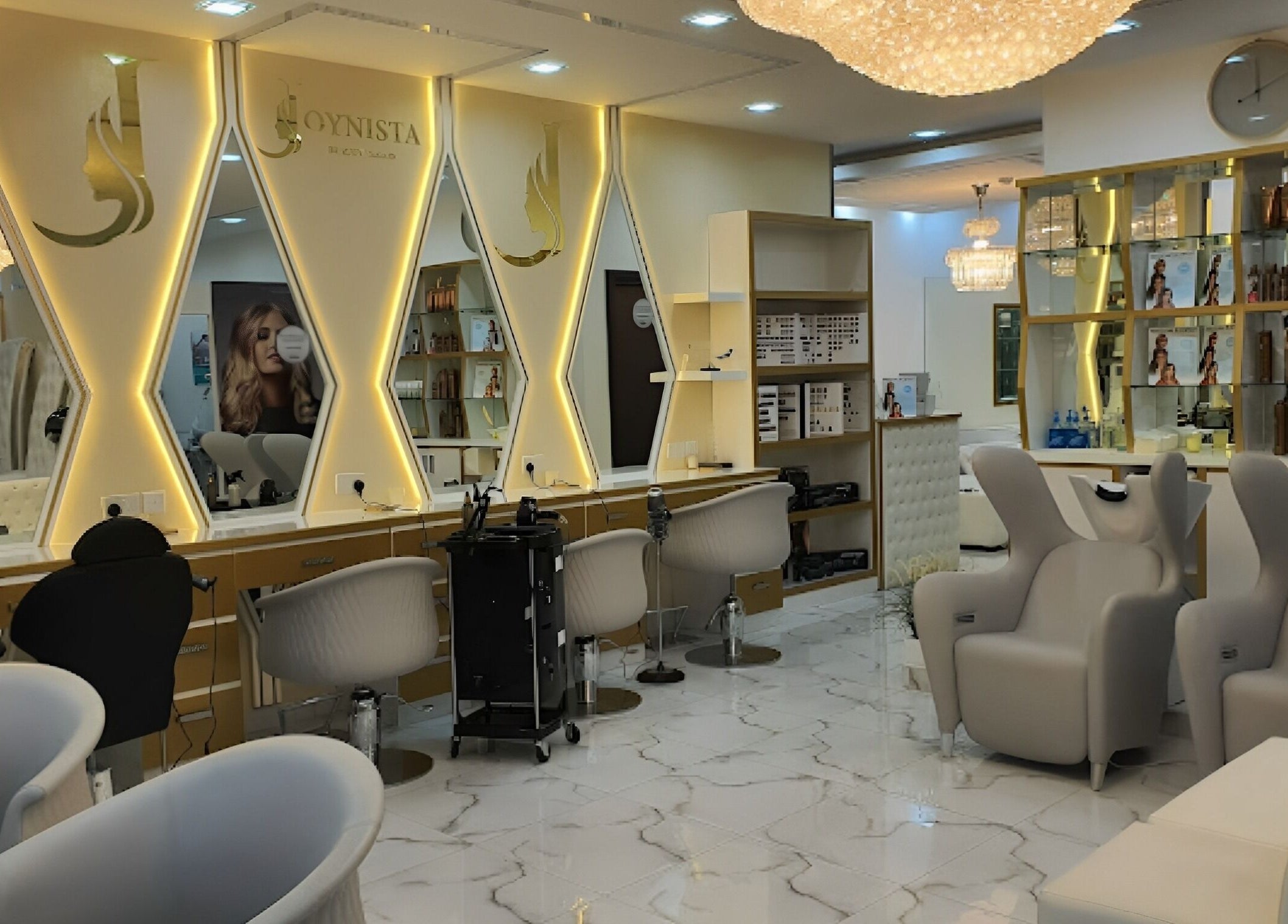 Elegant and modern interior of Rebo Beauty Salon in Dubai, AE, featuring stylish seating and illuminated mirrors.