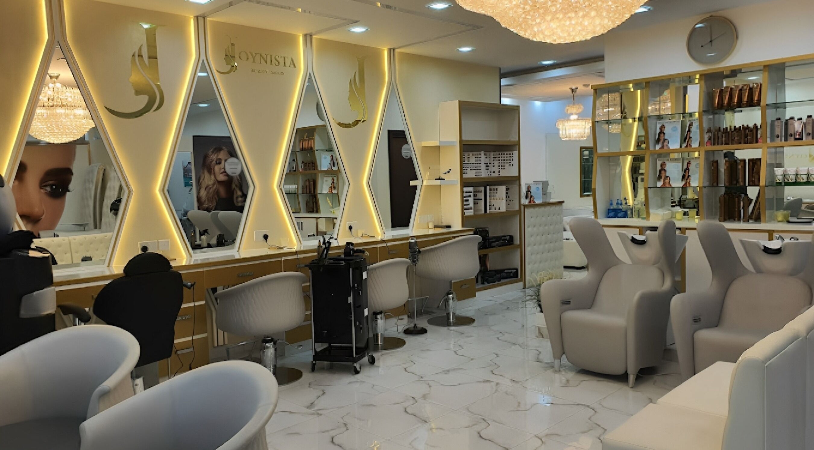 Elegant and modern interior of Rebo Beauty Salon in Dubai, AE, featuring stylish seating and illuminated mirrors.